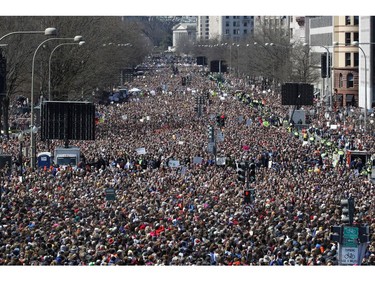 Looking west from the stage area, the crowd fills Pennsylvania Avenue during the "March for Our Lives" rally in support of gun control, Saturday, March 24, 2018, in Washington.