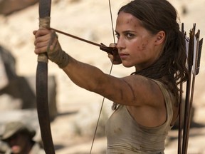 This image released by Warner Bros. Pictures shows Alicia Vikander in a scene from "Tomb Raider." It took weeks of training and plates full of protein to turn former ballerina Alicia Vikander into action star Lara Croft.