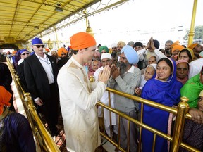 Prime Minister Justin Trudeau is greeted by crowds as he visits the Golden Temple in Amritsar, India on Wednesday, Feb. 21, 2018. THE CANADIAN PRESS/Sean Kilpatrick