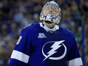 Andrei Vasilevskiy of the Tampa Bay Lightning reacts after giving up a third goal in the first period during a game against the Ottawa Senators at Amalie Arena on March 13, 2018