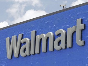 This June 1, 2017, file photo, shows a Walmart sign at one of their stores.
