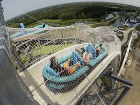 In this July 9, 2014, file photo, riders go down the water slide called "Verruckt" at Schlitterbahn Waterpark in Kansas City, Kan.