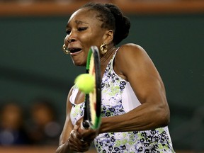 Venus Williams returns a shot to Daria Kasatkina of Russia during semifinals of the BNP Paribas Open at the Indian Wells Tennis Garden on March 16, 2018 in Indian Wells, Calif.  (Matthew Stockman/Getty Images)