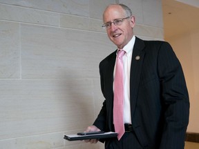 In this March 8, 2018, photo, Rep. Mike Conaway, R-Texas, left, at the Capitol in Washington. Republicans on the House intelligence committee have completed a draft report concluding there was no collusion or coordination between Donald Trump's presidential campaign and Russia. The finding is sure to please the White House and enrage panel Democrats who have not yet seen the document. After a yearlong investigation, Conaway says the committee has finished doing witness interviews.