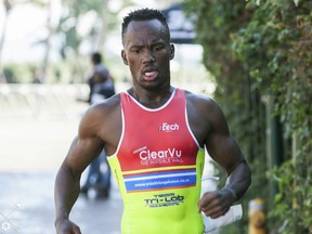 In this photo taken June 21, 2015 and supplied by B-Active Sports, Mhlengi Gwala competes in an event in Durban, South Africa.