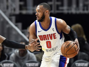 In a photo from Feb. 28, 2018, Grand Rapids Drive forward Zeke Upshaw looks to pass during a basketball game in Detroit. (AP Photo/Jose Juarez)