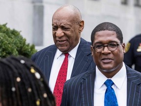 Actor and comedian Bill Cosby leaves with his spokesman Andrew Wyatt after a pretrial hearing in the sexual assault trial against actor and comedian Bill Cosby at the Montgomery County Courthouse in Norristown, Pennsylvania on March 30, 2018
