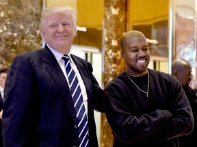 Kanye West and then-U.S. President-elect Donald Trump speak with the press after their meetings at Trump Tower Dec. 13, 2016, in New York.