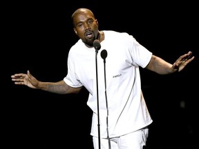 FILE - In this Aug. 28, 2016 file photo, Kanye West speaks at the MTV Video Music Awards in New York. A lawsuit filed Tuesday, Aug. 1, 2017, by representatives for West claims that insurers have failed to pay nearly $10 million for West's canceled Saint Pablo Tour last year. The suit filed by Very Good Touring against several Lloyd's of London syndicates alleges breach of contract and seeks punitive damages and attorney fees beyond the $9.8 million in concert losses.