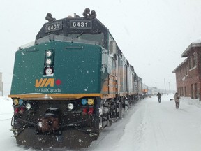 In this file photo, The Canadian VIA Rail train that travels from Toronto to Vancouver stops in Hornepayne, Ont., on Mar. 20, 2013.