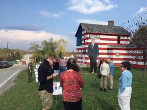 In this Facebook photo, onlookers gather outside the "Trump House" in Unity Township, Pa., during the 2016 U.S. Presidential Election.