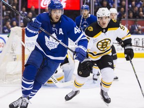 Toronto Maple Leafs' Tyler Bozak skates for the puck during a Game 4 loss to the Boston Bruins on April 19, 2018