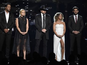 Luke Bryan, from left, Miranda Lambert, Jason Aldean, Maren Morris and Thomas Rhett speak at the 53rd annual Academy of Country Music Awards at the MGM Grand Garden Arena on Sunday, April 15, 2018, in Las Vegas.  (Chris Pizzello/Invision/AP)