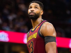 Tristan Thompson #13 of the Cleveland Cavaliers looks to the scoreboard during the second half at Quicken Loans Arena on April 11, 2018 in Cleveland, Ohio. The Knicks defeated the Cavaliers