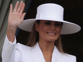 WASHINGTON, DC - APRIL 24:  U.S. first lady Melania Trump waves during a state arrival ceremony at the South Lawn of the White House April 24, 2018 in Washington, DC. Trump is hosting French President Emmanuel Macron for a two-day official visit that includes dinner at George Washington's Mount Vernon, a tree planting on the White House South Lawn, an Oval Office meeting, a joint news conference and a state dinner.