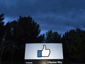 A lit sign is seen at the entrance to Facebook's corporate headquarters location in Menlo Park, Calif. (JOSH EDELSON/AFP/Getty Images)