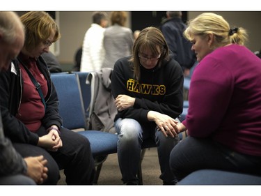 Families, friends and supporters of the Humboldt hockey team gathered in Nipawin's Apostolic Church as they wait for news of loved ones on April 6, 2018 after a bus carrying a junior ice hockey team collided with a semi-trailer truck between Tisdale and Nipawin, Saskatchewan province, killing 14 people. Hockey-mad Canada was in mourning on Saturday after a bus carrying a junior ice hockey team collided with a semi-trailer truck in Saskatchewan province, killing 14 people.In a country where love of the sport is almost a religion, the crash sparked an outpouring of grief among players and fans on social media, while national political leaders expressed their sympathies."We can now confirm 14 people have died as a result of this collision," the Royal Canadian Mounted Police said in a statement, which did not say how many of the victims were players or coaches of the Humboldt Broncos team.