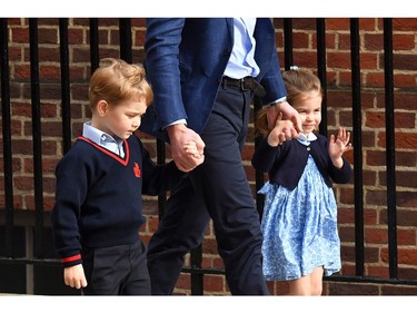 Princess Charlotte of Cambridge (R) waves at the media as she is led in with her brother Prince George of Cambridge (L) by their father Britain's Prince William, Duke of Cambridge, (C) at the Lindo Wing of St Mary's Hospital in central London, on April 23, 2018, to visit Catherine, Duchess of Cambridge, and their new-born brother, the Duke and Duchess's third child.   Kate, the wife of Britain's Prince William, has given birth to a baby son, Kensington Palace announced Monday. "Her Royal Highness The Duchess of Cambridge was safely delivered of a son at 11:01 (1001 GMT)," the palace said in a statement. The baby boy weighs eight pounds and seven ounces (3.8 kilogrammes).