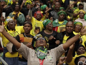 Mourners attend a memorial service for anti-apartheid activist Winnie Madikizela-Mandela at Orlando, Stadium, in Soweto, South Africa, Wednesday, April 11, 2018. The death of Madikizela-Mandela, often called the "Mother of the Nation," has triggered widespread soul-searching over the legacy of one of the nation's most important fighters against the previous regime of racial discrimination.