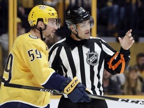 Predators defenceman Roman Josi argues a call with referee Jean Hebert during the first period in Game 2 of an NHL first-round playoff series against the Avalanche in Nashville, Tenn., on Saturday, April 14, 2018. (Mark Humphrey/AP Photo)