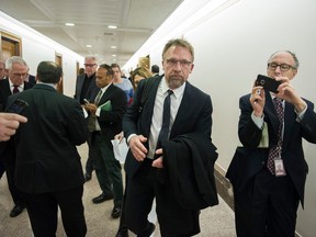 FILE -- In this Jan. 10, 2017 file photo, Backpage.com CEO Carl Ferrer leaves the Senate Homeland Security and Governmental Affairs subcommittee hearing on Capitol Hill in Washington. Ferrer will serve no more than five years in state prison under a plea agreement announced Thursday, April 12, 2018.