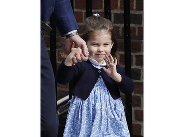 Britain's Prince William arrives with Princess Charlotte back to the Lindo wing at St Mary's Hospital in London London, Monday, April 23, 2018. The Duchess of Cambridge gave birth Monday to a healthy baby boy -- a third child for Kate and Prince William and fifth in line to the British throne.