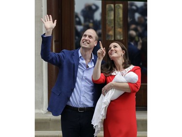Britain's Prince William and Kate, Duchess of Cambridge wave with their newborn baby son as they leave the Lindo wing at St Mary's Hospital in London London, Monday, April 23, 2018. The Duchess of Cambridge gave birth Monday to a healthy baby boy -- a third child for Kate and Prince William and fifth in line to the British throne.