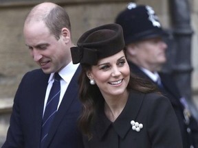 Britain's Prince William and Kate, Duchess of Cambridge, leave the annual Easter Sunday service at St George's Chapel at Windsor Castle in Windsor, England, Sunday April 1, 2018. (Simon Dawson/pool via AP) ORG XMIT: LON112