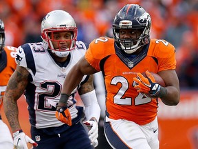 C.J. Anderson of the Denver Broncos runs with the ball against the New England Patriots in the AFC Championship game at Sports Authority Field at Mile High on January 24, 2016 in Denver. (Ezra Shaw/Getty Images)