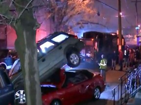 In this screenshot, car are piled on top of each other after a garbage truck smashed through the vehicle in Philadelphia, Penn. on Mar. 4, 2018.