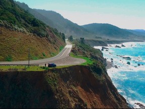 In this Wednesday, March 28, 2018 aerial image from Alameda County Sheriff's Office drone video courtesy of Mendocino County shows the pullout where the SUV of Jennifer and Sarah Hart was recovered off the off Pacific Coast Highway 1, near Westport, Calif. (Alameda County Sheriff's Office via AP)