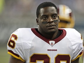 In this Sept. 27, 2009, file photo, Washington Redskins running back Clinton Portis looks on during the first quarter of an NFL football game against the Detroit Lions, in Detroit.  (AP Photo/Paul Sancya, File)