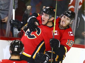 Flames Micheal Ferland (L) celebrates a second period goal with teammate Matthew Tkachuk during NHL action between the Detroit Red Wings and the Calgary Flames in Calgary Thursday, November 9, 2017. Jim Wells/Postmedia Postmedia Calgary Jim Wells, Jim Wells/Postmedia