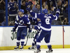 Lightning centre Brayden Point (21) celebrates his goal against the Devils with Tyler Johnson (9) during the first period of Game 2 of an NHL first-round playoff series Saturday, April 14, 2018, in Tampa, Fla.  (Chris O'Meara/AP Photo)