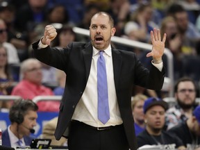 Orlando Magic head coach Frank Vogel directs his players against the Washington Wizards, Wednesday, April 11, 2018, in Orlando, Fla.