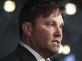 NDP MP Don Davies speaks to the media after caucus at Parliament Hill in Ottawa on Oct. 19, 2011. (Postmedia Network/Files)