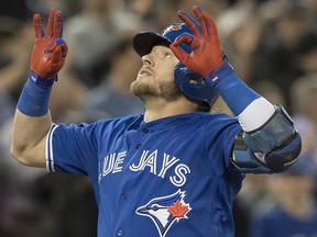 Toronto Blue Jays third baseman Josh Donaldson comes in to score against the Chicago White Sox in Toronto on Tuesday, April 3, 2018. (THE CANADIAN PRESS/Fred Thornhill)