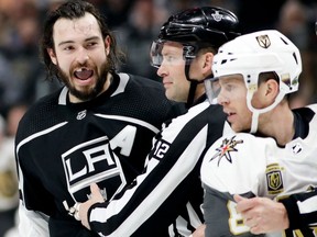 Los Angeles Kings defenceman Drew Doughty reacts after getting hit with a stick by Vegas Golden Knights center Jonathan Marchessault during Game 3 on April 15, 2018
