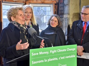 Environment Minister Catherine McKenna and Ontario Premier Kathleen Wynne speak at a funding announcement for the Green Ontario Fund Low-carbon Technology Incentive Program in Toronto, Ont. on Mar. 4, 2018.