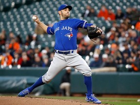 Toronto Blue Jays starting pitcher Marco Estrada throws to the Baltimore Orioles in the first inning of a baseball game, Wednesday, April 11, 2018, in Baltimore. (AP Photo/Patrick Semansky)