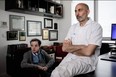 French medicine professor Laurent Lantieri (R), a specialist in hand and face transplant, poses with his patient Jerome Hamon.