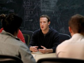 In this Nov. 9, 2017, file photo, Facebook CEO Mark Zuckerberg meets with a group of entrepreneurs and innovators during a round-table discussion at Cortex Innovation Community technology hub in St. Louis.