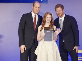 Faith Dickinson is shown in a handout photo with Prince William and Prince Harry. Dickinson, a fifteen-year-old southern Ontario girl, has scored an invitation to the wedding of Prince Harry and Meghan Markle for her charity work. (THE CANADIAN PRESS/HO-The Diana Award)