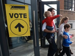 Liberal leader Justin Trudeau and family leave a polling station after voting in Montreal, Quebec on Monday, October 19, 2015.