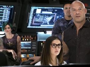 This image released by Paramount Pictures shows, from left, Ruby Rose as Adele Yusef, Nina Dobrev as Rebecca Clearidge, Tony Gonzalez as Paul Donovan, and Vin Diesel as Xander Cage in "xXx: The Return of Xander Cage." (George Kraychyk/Paramount Pictures and Revolution Studios via AP) ORG XMIT: NYET760