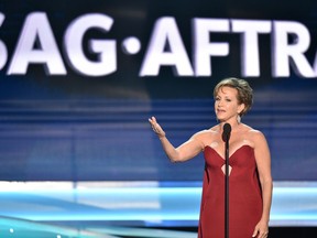 FILE - In this Jan. 21, 2018 file photo, SAG-AFTRA President Gabrielle Carteris speaks at the 24th annual Screen Actors Guild Awards in Los Angeles. The Screen Actors Guild is calling on an end to auditions in private hotel rooms and residences in the wake of the Harvey Weinstein scandal. SAG-AFTRA on Thursday issued new guidelines that expand the guild's code of conduct in an effort to curtail sexual harassment in the entertainment industry.