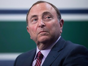 NHL commissioner Gary Bettman listens after announcing the 2019 NHL Entry Draft will be held in Vancouver, during a news conference on Wednesday, February 28, 2018. (THE CANADIAN PRESS/Darryl Dyck)