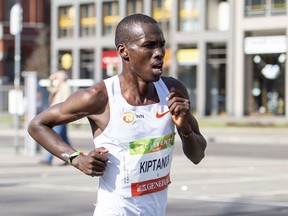 Erick Kiptanui from Kenya  is on his way to win the Berlin Half-Marathon race in Berlin, Germany, Sunday, April 8, 2018.