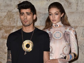 Zayn Malik and Gigi Hadid attend the Givenchy show as part of the Paris Fashion Week Womenswear Spring/Summer 2017 on October 2, 2016 in Paris, France. (Photo by Pascal Le Segretain/Getty Images)
