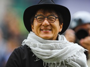 Jackie Chan looks on during the start of the FIA world Endurance Championship race in Shanghai on November 5, 2017.  ( STR/AFP/Getty Images)